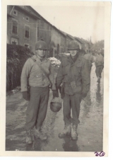 <h5>Combat</h5><p>Soldiers on a street in France. Photo provided by the family of Elmore Willets. </p>