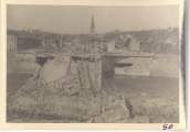 <h5>Combat</h5><p>View into Germany with a bridge destroyed by Germans. Photo provided by the family of Elmore Willets. </p>