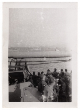 <h5>Journey Home</h5><p>Possibly aboard the USS Sea Porpoise heading back to US. Provided by the family of Ivo Schommer.</p>