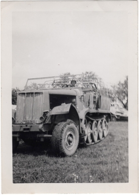 <h5>German truck</h5><p>Appears to be Clint Stillman on captured German vehicle. Provided by the family of Ivo Schommer.</p>