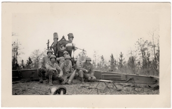 <h5>Firing Squad</h5><p>Identities unknown. Photo provided by family of Ivo Schommer.</p>