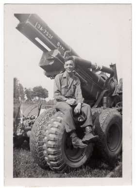 <h5>Firing Squad</h5><p>Unidentified soldier on cannon. Photo provided by family of Ivo Schommer.</p>