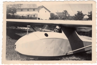 <h5>Ivo Schommer in Glider</h5><p>Ivo Schommer posing in a glider. Photo provided by family of Ivo Schommer.</p>